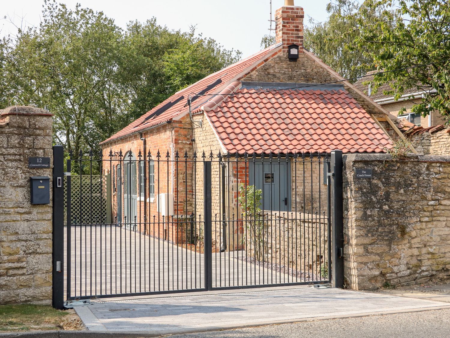 The Coach House and its gated entrance in Cranwell Village
